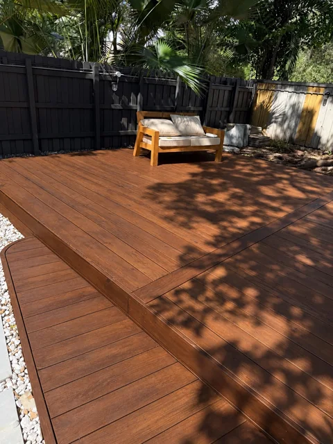 Completed wood deck with handcrafted seating and a framed perimeter