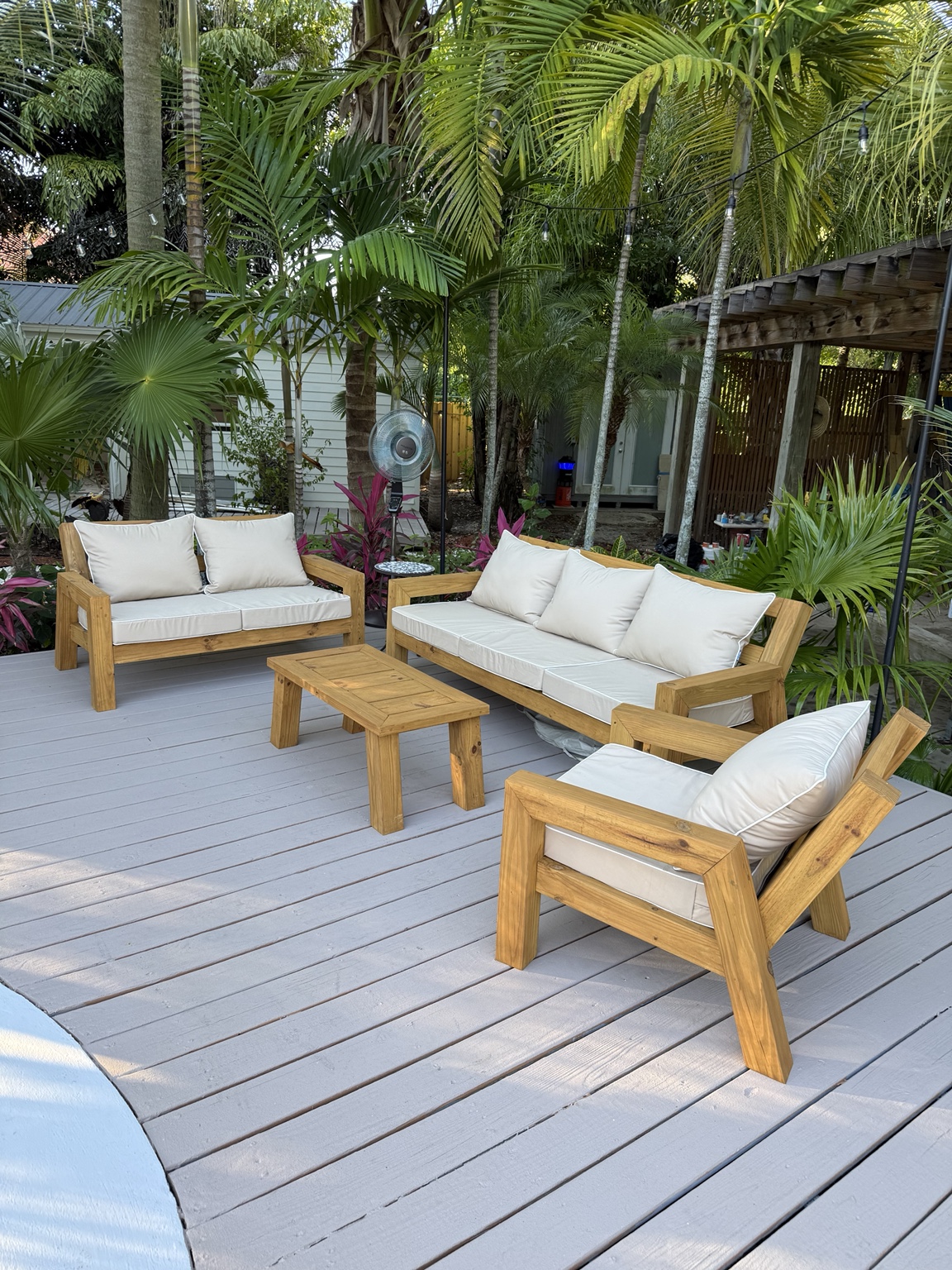 Essence on a tropical poolside deck — real customer delivery