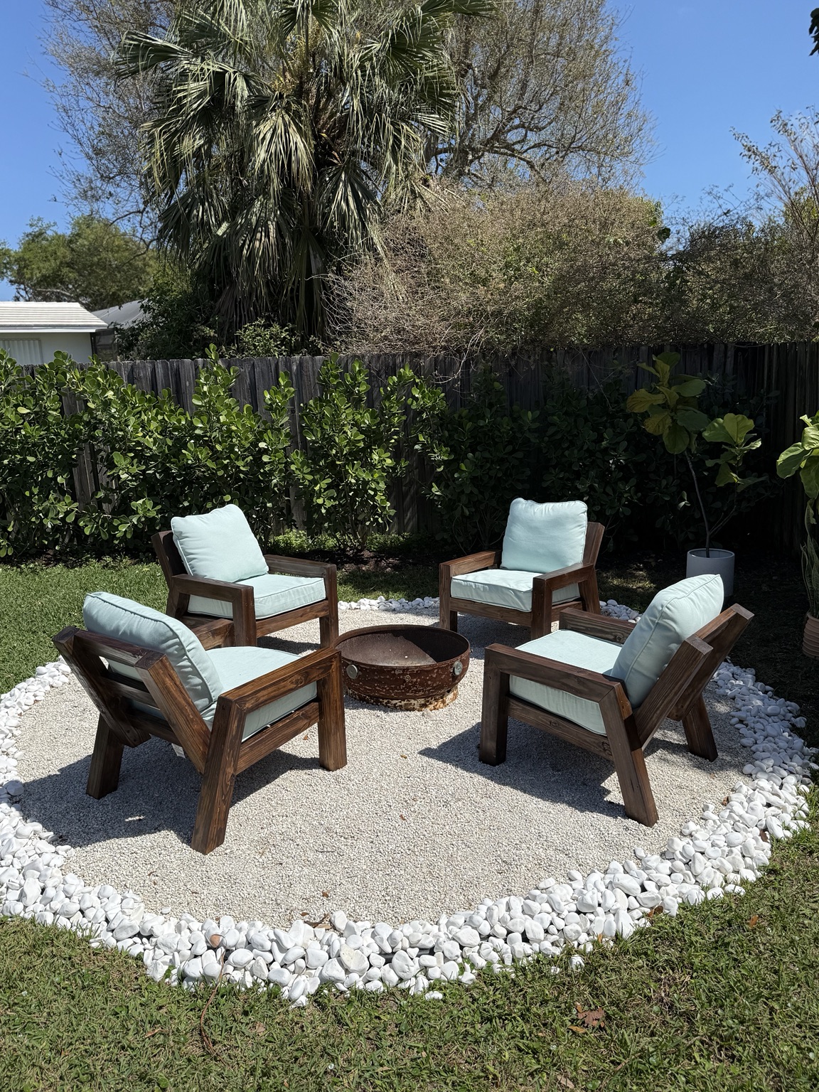 Essence chairs around the fire pit — real customer delivery