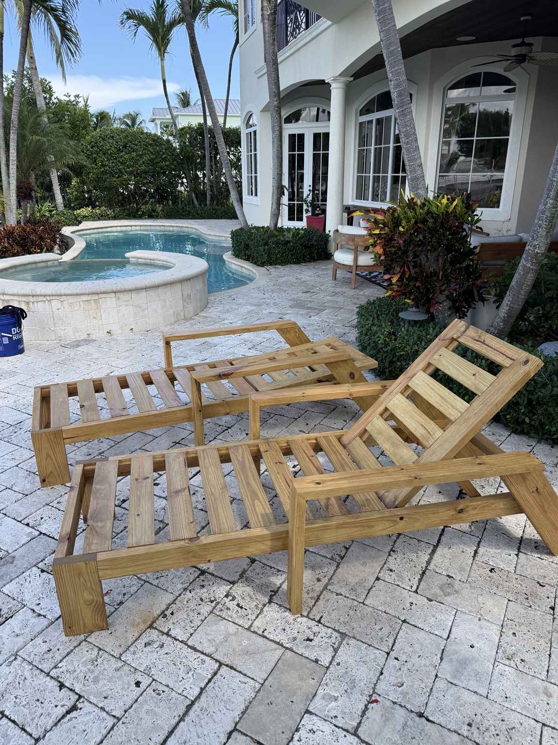 Sol wood frames beside the pool